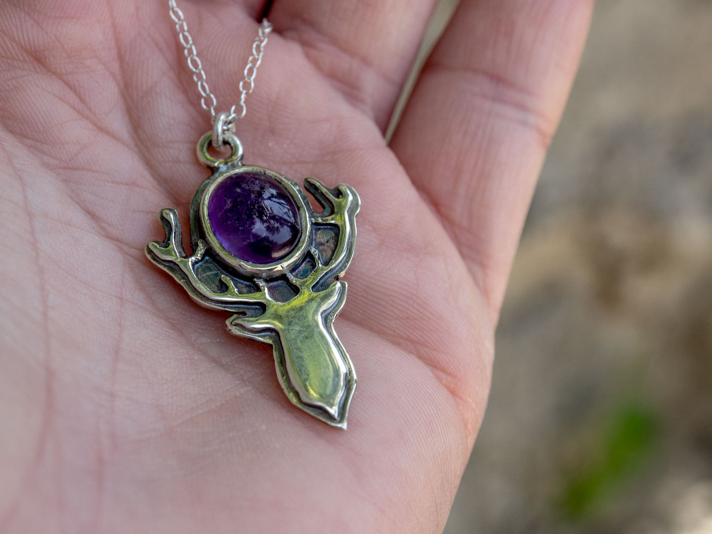 Sterling silver pendant with an Amethyst and a deer