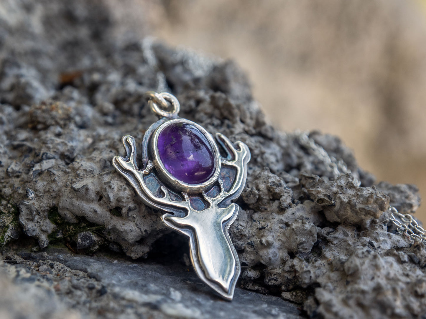 Sterling silver pendant with an Amethyst and a deer