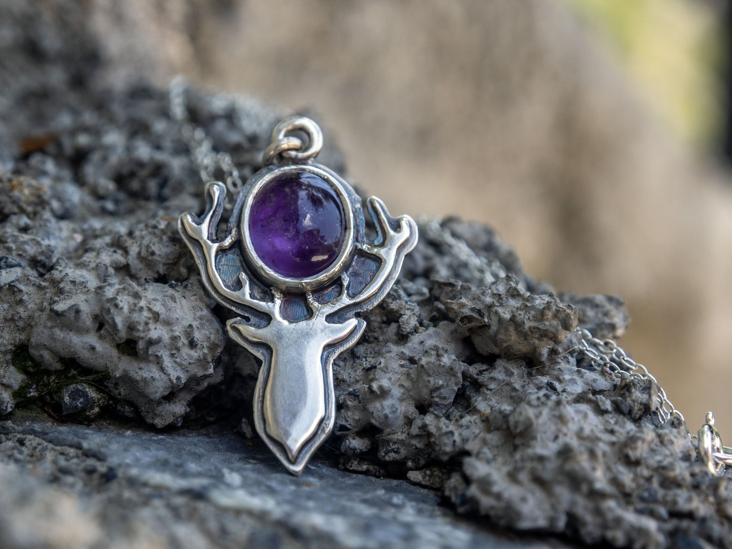 Sterling silver pendant with an Amethyst and a deer