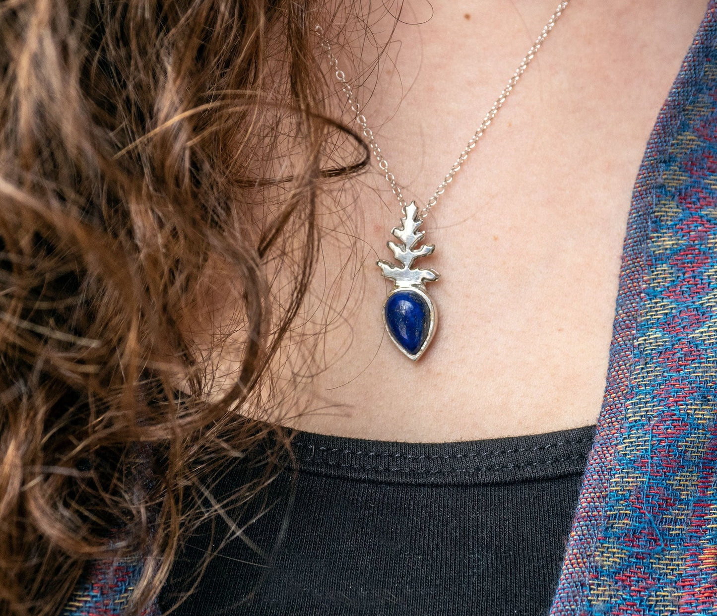 Sterling silver pendant with a Lapis Lazuli and a fern