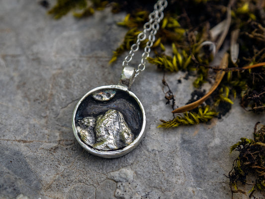 Mini sterling silver pendant with a mountain scene