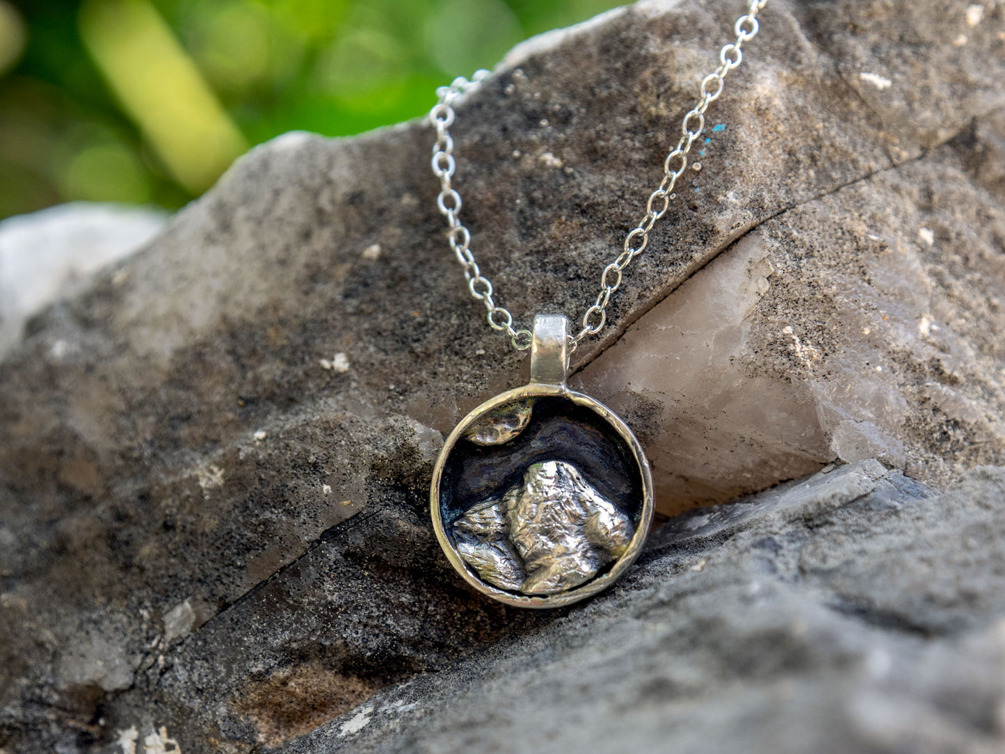 Mini sterling silver pendant with a mountain scene