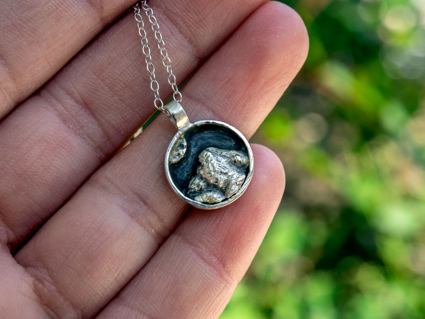 Mini sterling silver pendant with a mountain scene