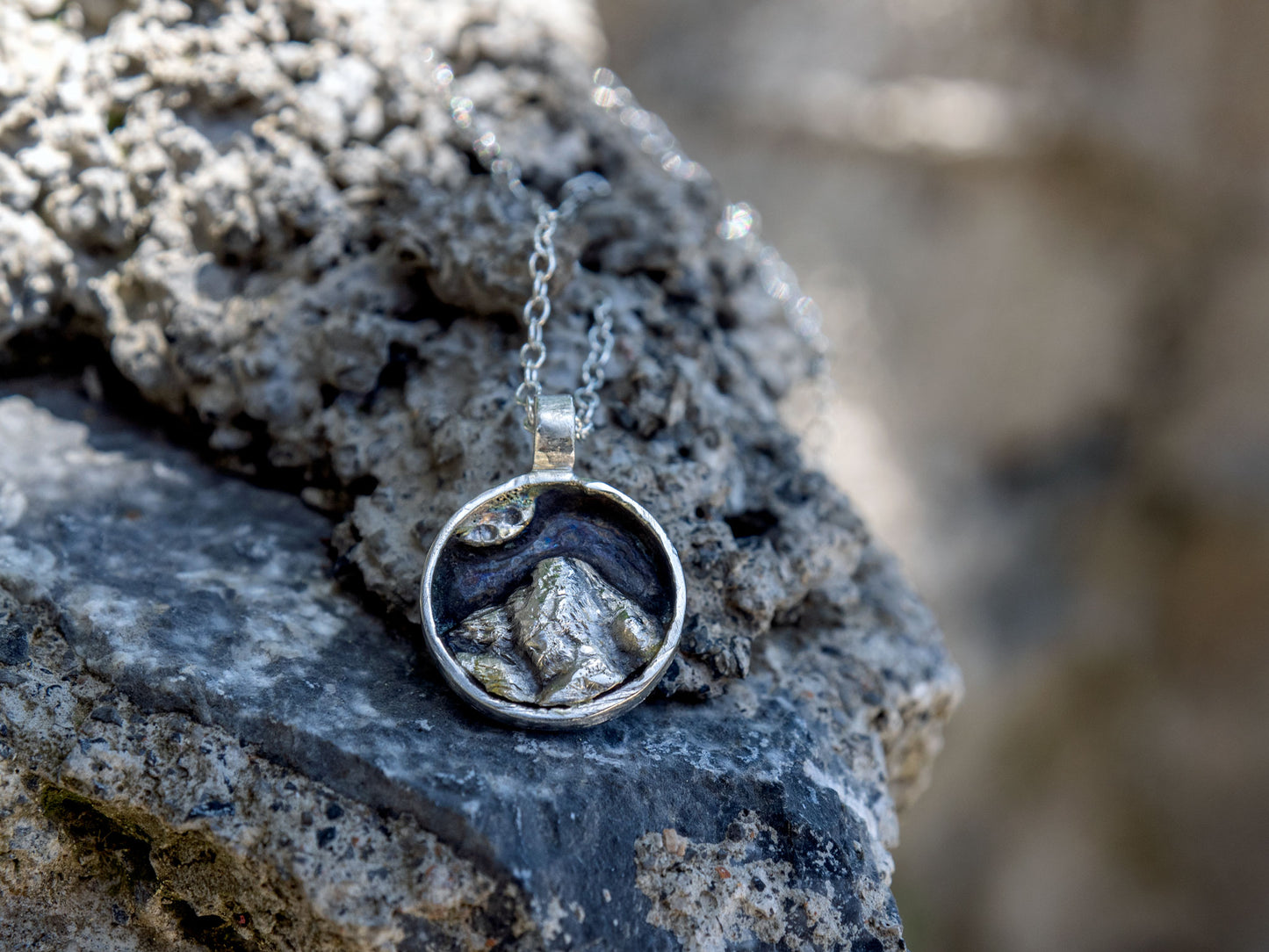 Mini sterling silver pendant with a mountain scene